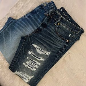2 pairs of American Eagle jeans.  Sizes 33x32 and 34x32